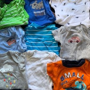 bunch of newborn bodysuits